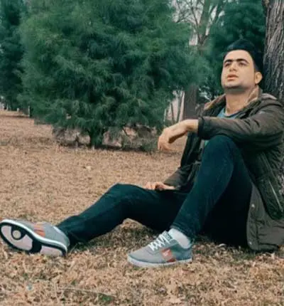 آهنگ دل پر خون لب خندون من از علی قنبری